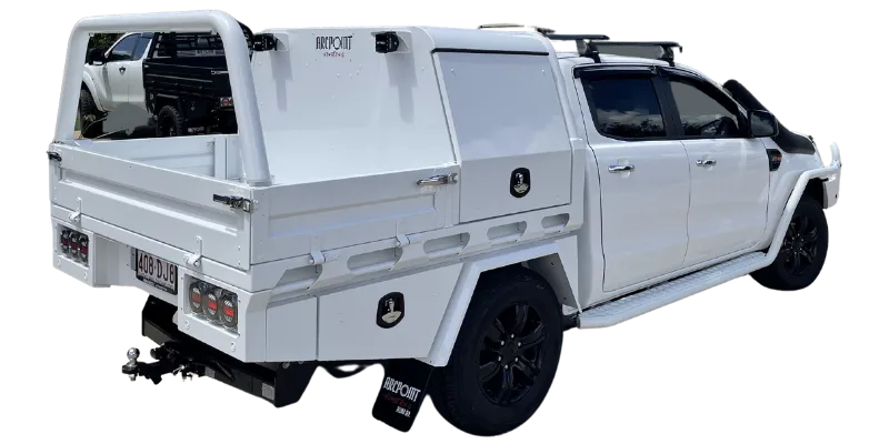 A white custom-built off-road caprice truck bed with a rear utility cage and roof rack, shown from a three-quarter rear angle on a white background.