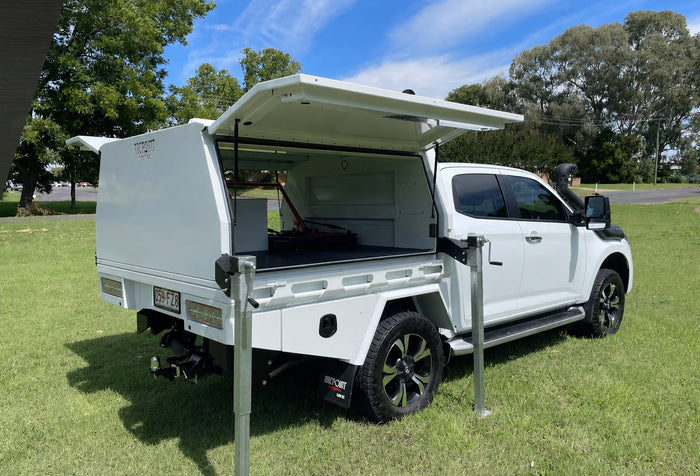 ArcPoint Lift-Off Package canopy raised on support legs off a ute tray, showing the removable canopy system